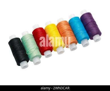 A set of multicolored threads on a white background isolated with clipping path Stock Photo