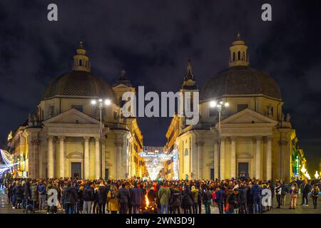 Rome, Italy–Dec 26, 2023: Via del Corso and with church Santa Maria and lots of tourists in Christmas time Stock Photo