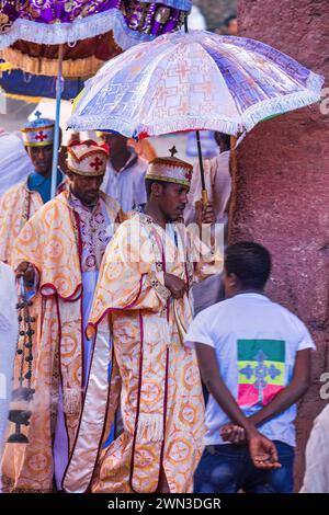 LALIBELA, ETHIOPIA - JAN 29, 2019: Unidentified Ethiopian priest during Timkat festival in Ehtiopia Unidentified Ethiopian priest with umbrella *** LA Stock Photo