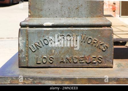 close up base of a cast iron pillar with inscription union iron works on street in los angeles california Stock Photo