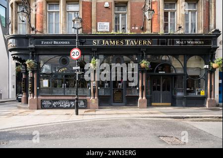St James Tavern, a traditional pub at the corner of Great Windmill Street and Denman Street Soho London UK Stock Photo