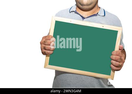 A man holding blank school blackboard sign on a white background Stock Photo