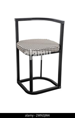 Black and white checkered upholstered stool on metal frame Stock Photo