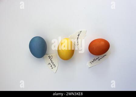 An Easter-themed eggs with painted words representing holiday phases Stock Photo