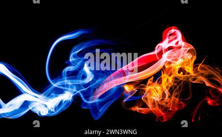 colored smoke isolated on black background Stock Photo