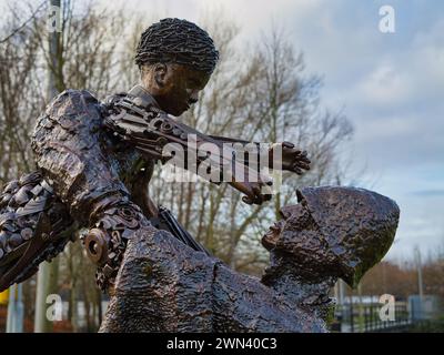 St Helens, UK - Jan 4 2024: The Worker's Memorial Statue in St Helens, England, UK. A memorial to workers who have lost their lives at work Stock Photo