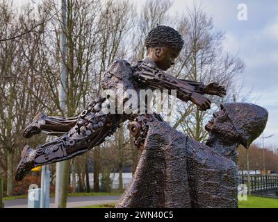 St Helens, UK - Jan 4 2024: The Worker's Memorial Statue in St Helens, England, UK. A memorial to workers who have lost their lives at work Stock Photo