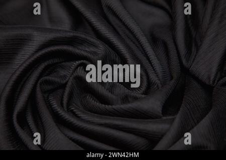 Black textured silk abstract background Stock Photo