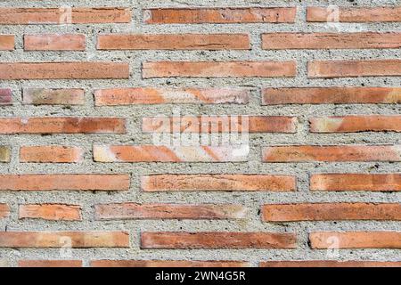 Thin and long bricks on a wall, Alicante, Spain Stock Photo