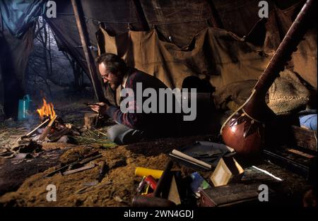 Living Off Grid 1980s UK. Child, young boy in his father office - a ...