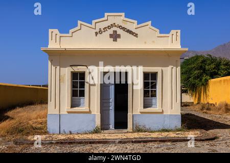 the blue and white infirmary or hospital building in the centre of the Tarrafel concentration camp on Santiago Cape Verde by Portuguese government Stock Photo