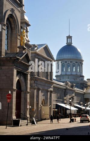 The domed Bonsecours Market and Notre-Dame-de-Bon-Secours chapel (left) are landmarks and popular tourist attractions in historic Old Montreal. Stock Photo