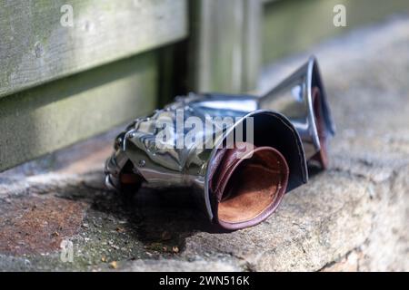 Close-up on a pair of gauntlet on the top of a stone wall. Stock Photo