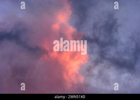 Evening sunlight reflected from stormy cumulus clouds - central France. Stock Photo