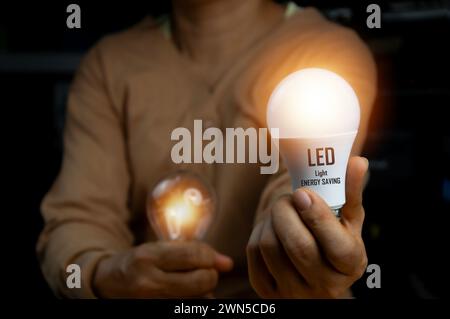 The concept of choosing LED light bulbs will help save energy. Stock Photo