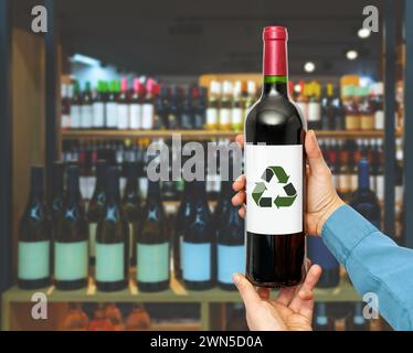 Recycle symbol on the wine bottle. Recycle standart for wine bottles e-labelling. Stock Photo