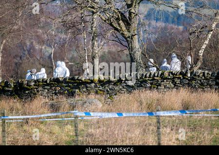 Pitilie, near Aberfeldy, UK. 29th Feb, 2024. This is Police Scotland Forensics searchin the murder scene of Brian Low on the very popular footpath. The White suited teams are on their hands and knees methodically searchin every inch of the scene. The whole scene has been sectioned off and will take days to search. Credit: JASPERIMAGE/Alamy Live News Stock Photo