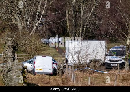 Pitilie, near Aberfeldy, UK. 29th Feb, 2024. This is Police Scotland Forensics searchin the murder scene of Brian Low on the very popular footpath. The White suited teams are on their hands and knees methodically searchin every inch of the scene. The whole scene has been sectioned off and will take days to search. Credit: JASPERIMAGE/Alamy Live News Stock Photo