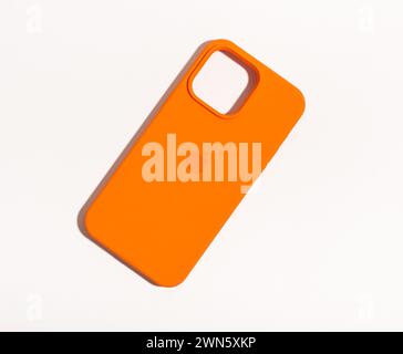 Berlin Germany January 21 2024 bright orange phone case protecting iphone. Stock Photo