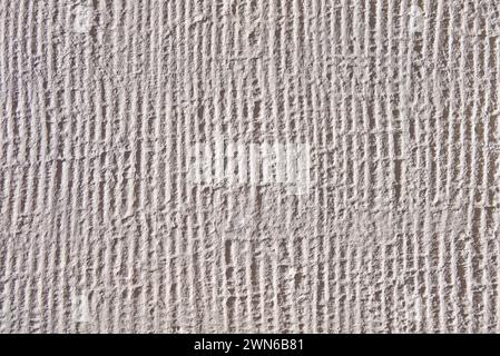 Ribbed bright plaster in close-up Stock Photo