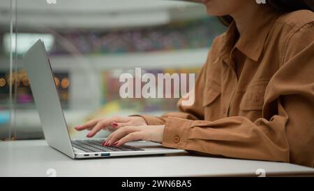 Close up female hands typing on laptop keyboard unrecognizable woman student girl freelancer studying e-learning online write business project Stock Photo