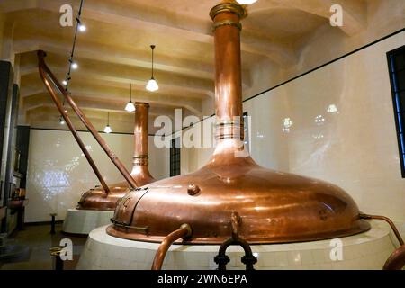 Pilsen, Czech Republic - June 01, 2017. Copper brewing tanks in old brewhouse, part of Pilsner Urquell Brewery Stock Photo
