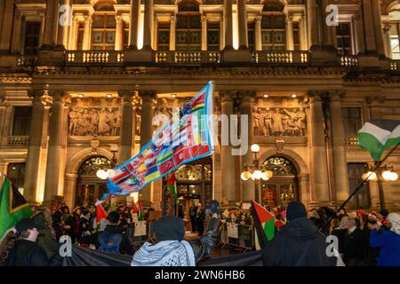 Glasgow, Scotland, UK. 29th Feb, 2024. Palestinian supporters gather outside the Civic Reception for 2024 World Athletics Indoor Championships. The Reception in the City Chambers was attended by representatives of the athletics world including Sebastian Coe. Protesters voiced their opposition to the the participation of Israeli athletes in the world championships being held in Glasgow from 1st-3rd March. Stock Photo