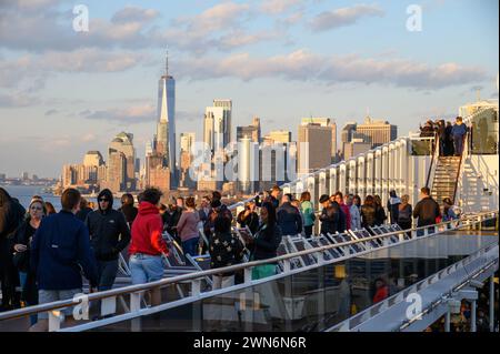 Passengers on board the MSC Meraviglia as it departs New York City Stock Photo