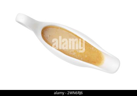 Delicious turkey gravy in sauce boat isolated on white, top view Stock Photo