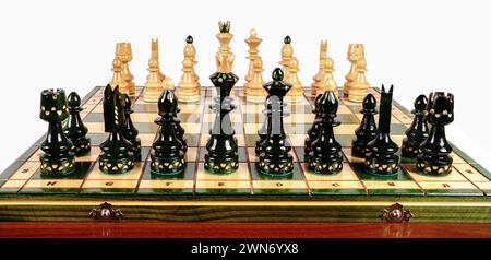 Chess board on the round white table. View with chess pieces on a chess table in contes Stock Photo