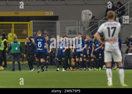 Milan, Italy. 28th Feb, 2024. Italy, Milan, february 28 2024: Federico Dimarco (FC Inter) scores and celebrates the 3-0 goal at 54' during soccer game FC Inter vs Atalanta BC, Serie A 2023-2024 recovery day 21 at San Siro Stadium (Credit Image: © Fabrizio Andrea Bertani/Pacific Press via ZUMA Press Wire) EDITORIAL USAGE ONLY! Not for Commercial USAGE! Stock Photo