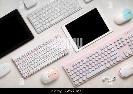 Composition with modern devices on light background Stock Photo