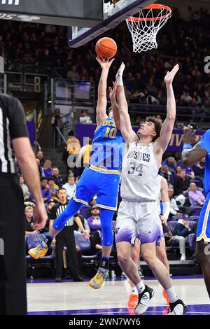 Seattle, WA, USA. 29th Feb, 2024. UCLA Bruins guard Lazar Stefanovic (10) shoots over Washington Huskies center Braxton Meah (34) during the NCAA Basketball game between the UCLA Bruins and Washington Huskies at Hec Ed Pavilion in Seattle, WA. Washington defeated UCLA 94-77. Steve Faber/CSM (Credit Image: © Steve Faber/Cal Sport Media). Credit: csm/Alamy Live News Stock Photo