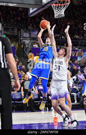 Seattle, WA, USA. 29th Feb, 2024. UCLA Bruins guard Lazar Stefanovic (10) goes up to shoot against Washington Huskies center Braxton Meah (34) during the NCAA Basketball game between the UCLA Bruins and Washington Huskies at Hec Ed Pavilion in Seattle, WA. Washington defeated UCLA 94-77. Steve Faber/CSM (Credit Image: © Steve Faber/Cal Sport Media). Credit: csm/Alamy Live News Stock Photo