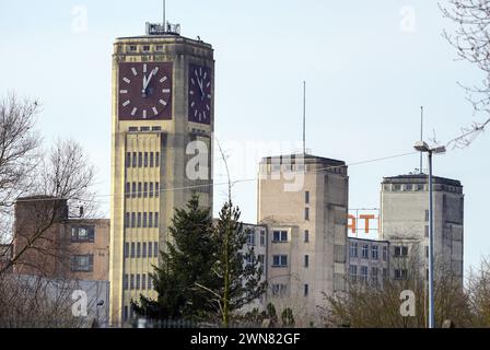 Wittenberge, Germany. 28th Feb, 2024. The clock tower of the former Singer or Veritas sewing machine factory is one of the city's landmarks. A business park is currently being built on the site. Credit: Soeren Stache/dpa/Alamy Live News Stock Photo