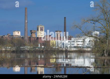 Wittenberge, Germany. 28th Feb, 2024. The clock tower of the former Singer or Veritas sewing machine factory is one of the city's landmarks. A business park is currently being built on the site. Credit: Soeren Stache/dpa/Alamy Live News Stock Photo