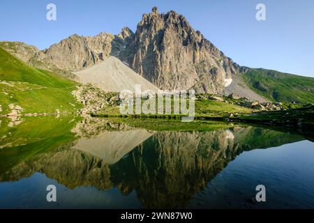 Midi d'Ossau peak, 2884 meters, and Pombie lake, Pyrenees National Park, Pyrenees Atlantiques, France Stock Photo