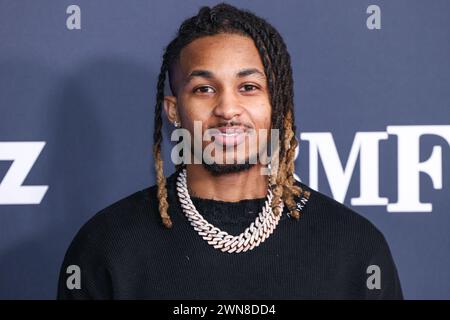 Hollywood, United States. 29th Feb, 2024. HOLLYWOOD, LOS ANGELES, CALIFORNIA, USA - FEBRUARY 29: DDG arrives at the Los Angeles Premiere Of STARZ' 'BMF' (Black Mafia Family) Season 3 held at the Hollywood Athletic Club on February 29, 2024 in Hollywood, Los Angeles, California, United States. (Photo by Xavier Collin/Image Press Agency) Credit: Image Press Agency/Alamy Live News Stock Photo