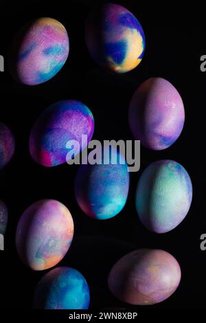Colorful Dyed Easter Eggs against black backdrop Stock Photo