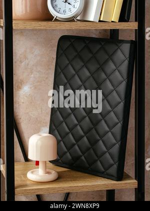 a leather folder for documents is on the shelf Stock Photo