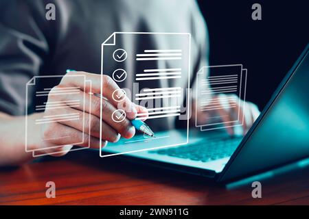 Document management or electronic signature concept, Businessman signing signature on electronic document at office, Digital signature, E-document, Te Stock Photo