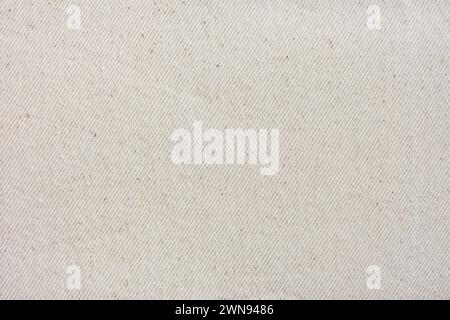 Canvas texture background light beige sepia of cotton burlap natural fabric, cloth for wallpaper and design backdrop. Close up white cloth texture bac Stock Photo