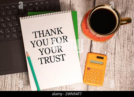 Thank you for your trust written on a blackboard. Stock Photo