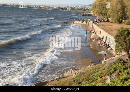 Tourists on Vouliagmeni Beach Athens Greece Stock Photo