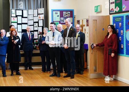 The Prince of Wales during a visit to Ysgol Yr Holl Saint/All Saint's School in Wrexham to see how the school is celebrating St David's Day and hear about how it is teaching its pupils about local Welsh history and cultural traditions. Picture date: Friday March 1, 2024. Stock Photo