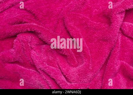 A pink towel fabric in a close up view Stock Photo