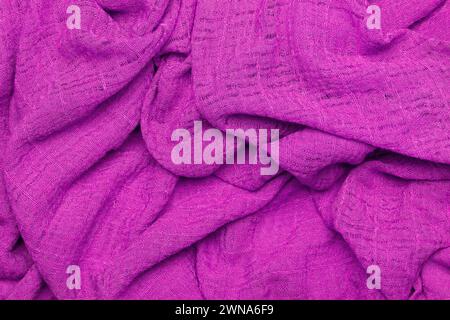 A purple fabric texture in a close up view Stock Photo