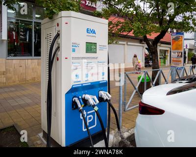 Sochi, Russia - February 13, 2023: Charging station installed next to the parking lot Stock Photo