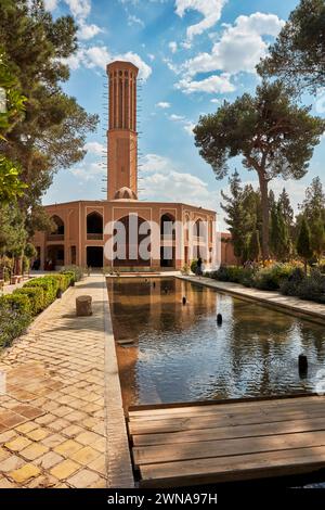 33-meter high 18th century octagonal windcatcher (badgir), the tallest adobe windcatcher in the world. Dowlatabad Garden, Yazd, Iran. Stock Photo