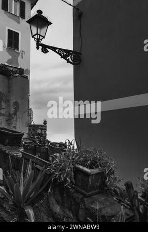 Embracing the beauty of Genoa in the rain through my lens. Every droplet tells a story, every puddle reflects a moment in time. Stock Photo